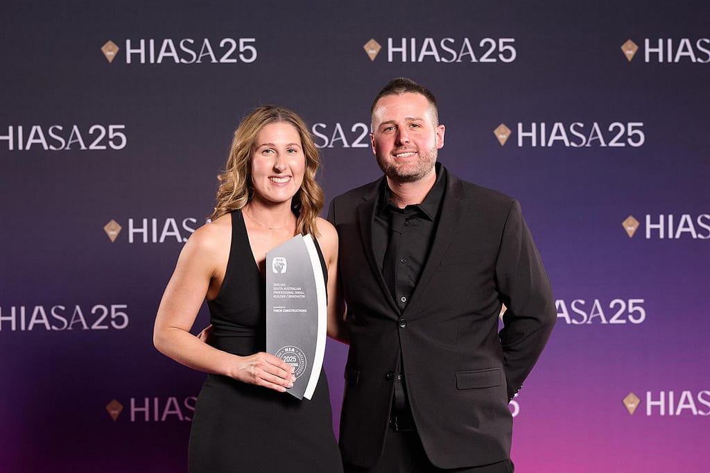 Finch Constructions Managing Director Gabby Finch and her brother Marcus celebrating the 2025 HIA Small Professional Builder/Renovator of the Year award in Adelaide