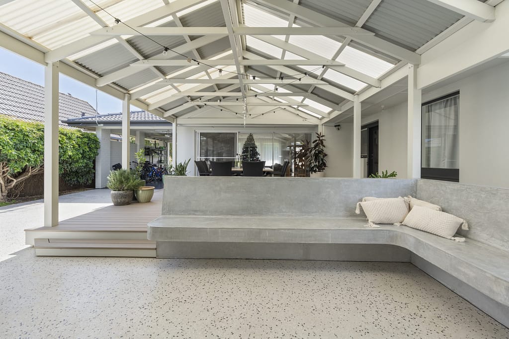 Outdoor living renovation connecting alfresco and backyard at Finch Wilkins in Glengowrie
