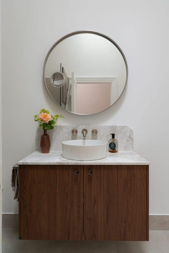 Barton bathroom vanity with round mirror