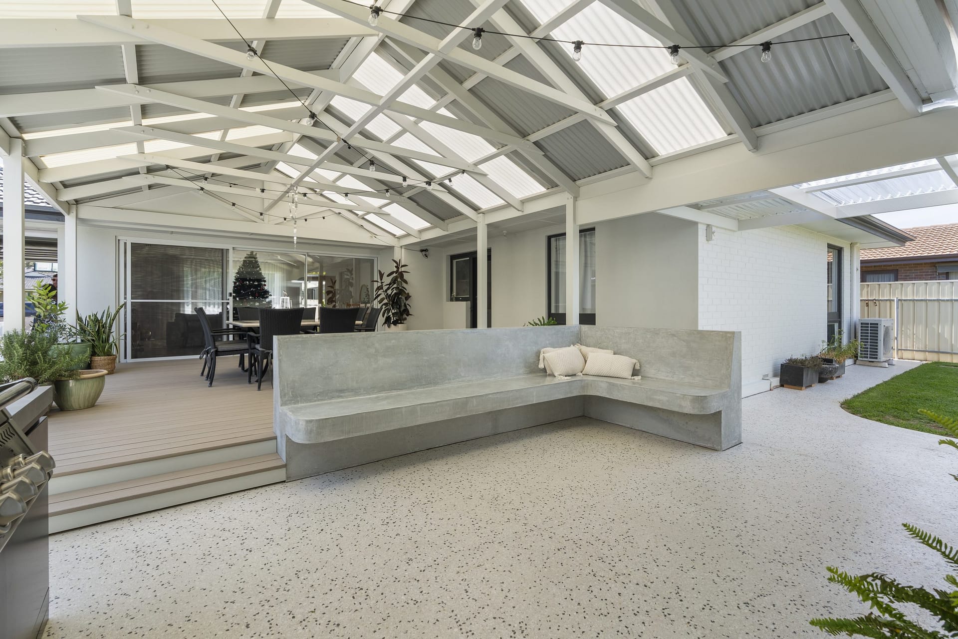 Outdoor living renovation connecting alfresco and backyard at Finch Wilkins in Glengowrie